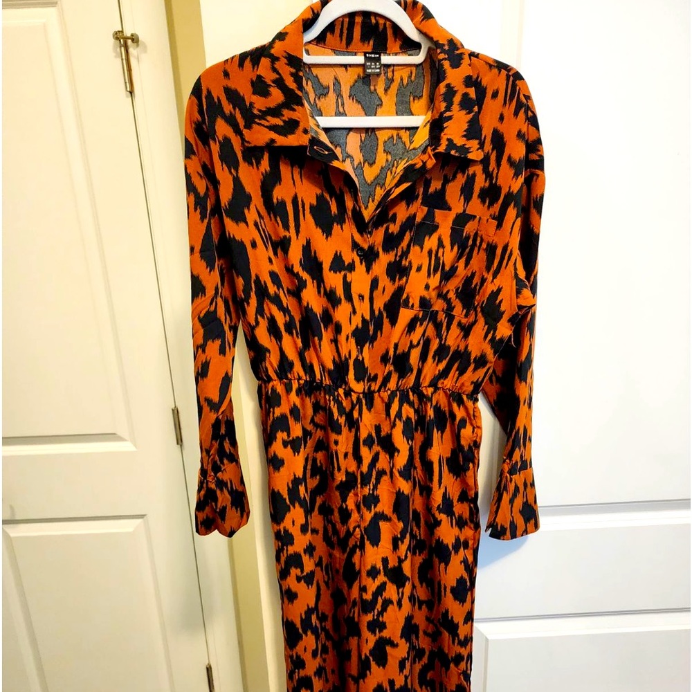 Cheetah printed Romper from Shein. New without tags.